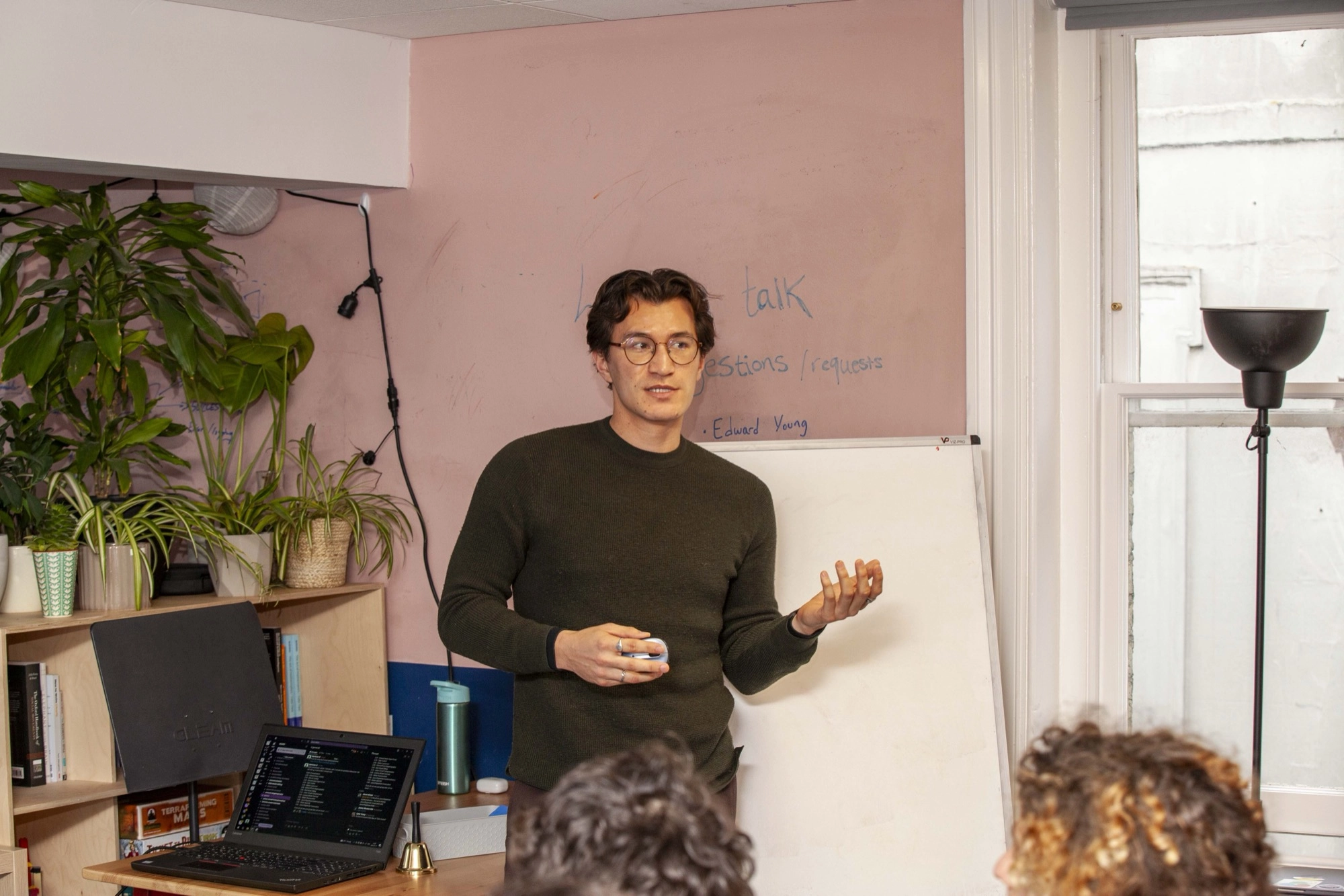 Participants gathered around a session at Meridian