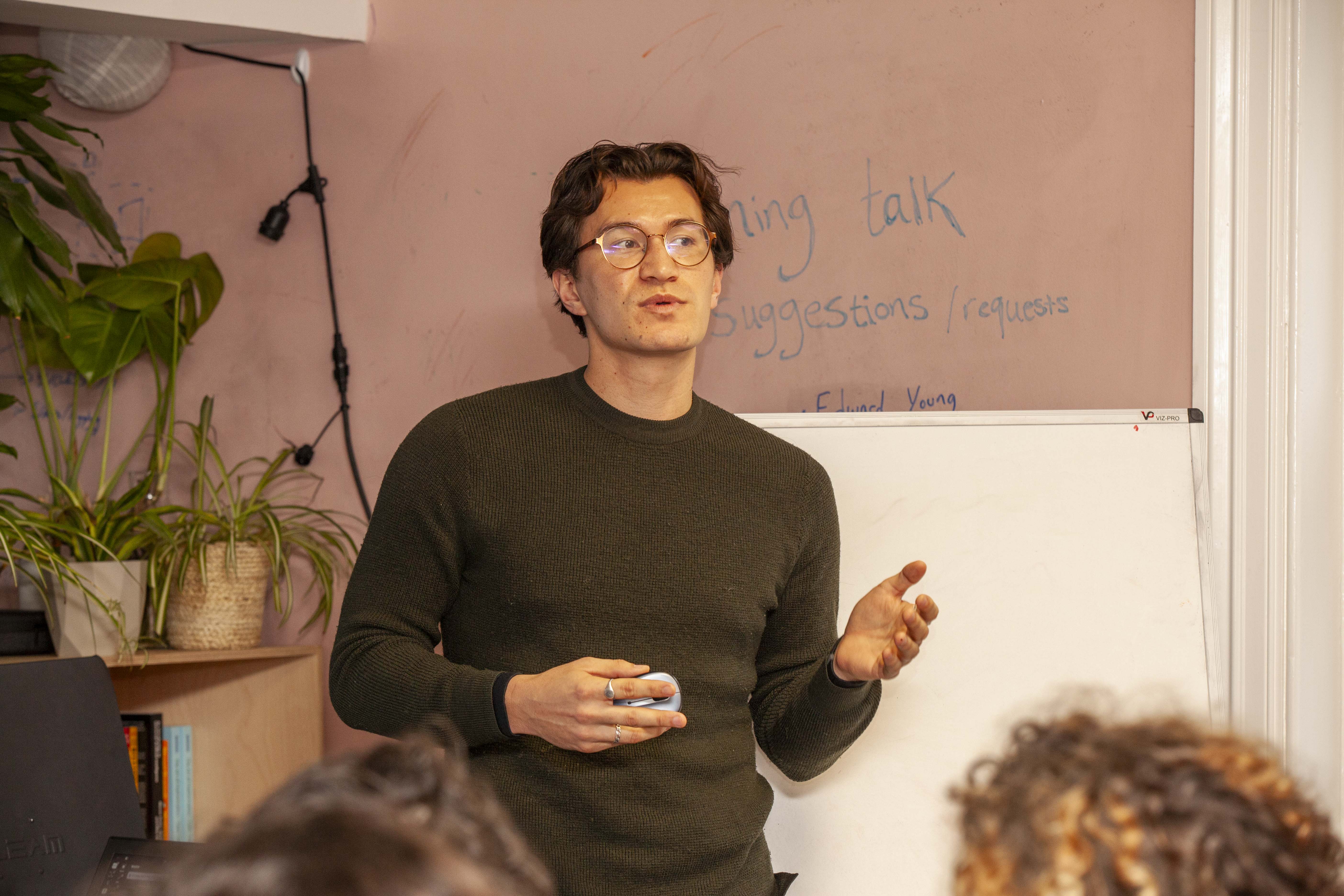 Participants gathered around a session at Meridian